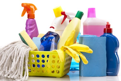 Professional Stroud Green carpet cleaner refreshing a living room carpet