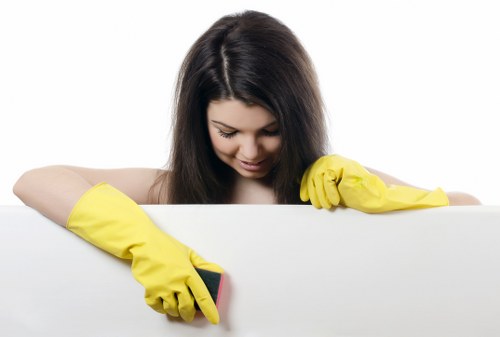 Fabric sofa being cleaned with professional equipment